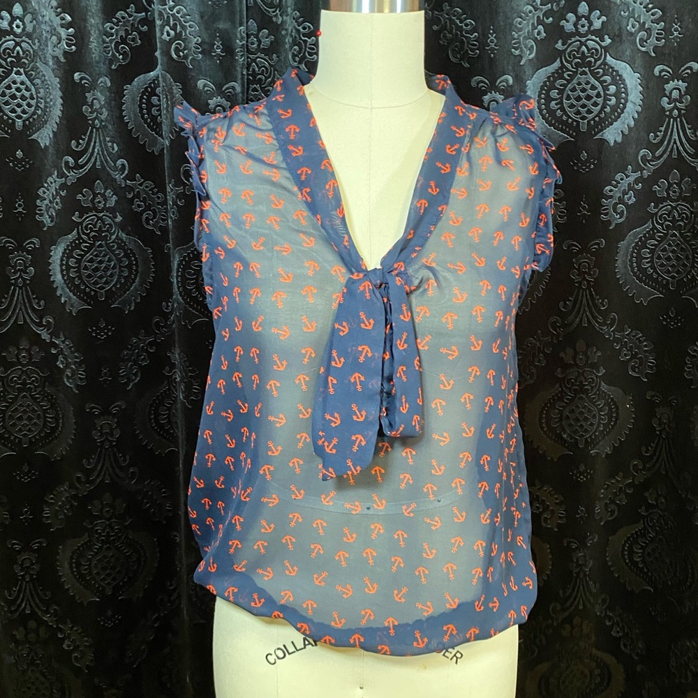 Eyelash Couture Blue Blouse with Orange Accents